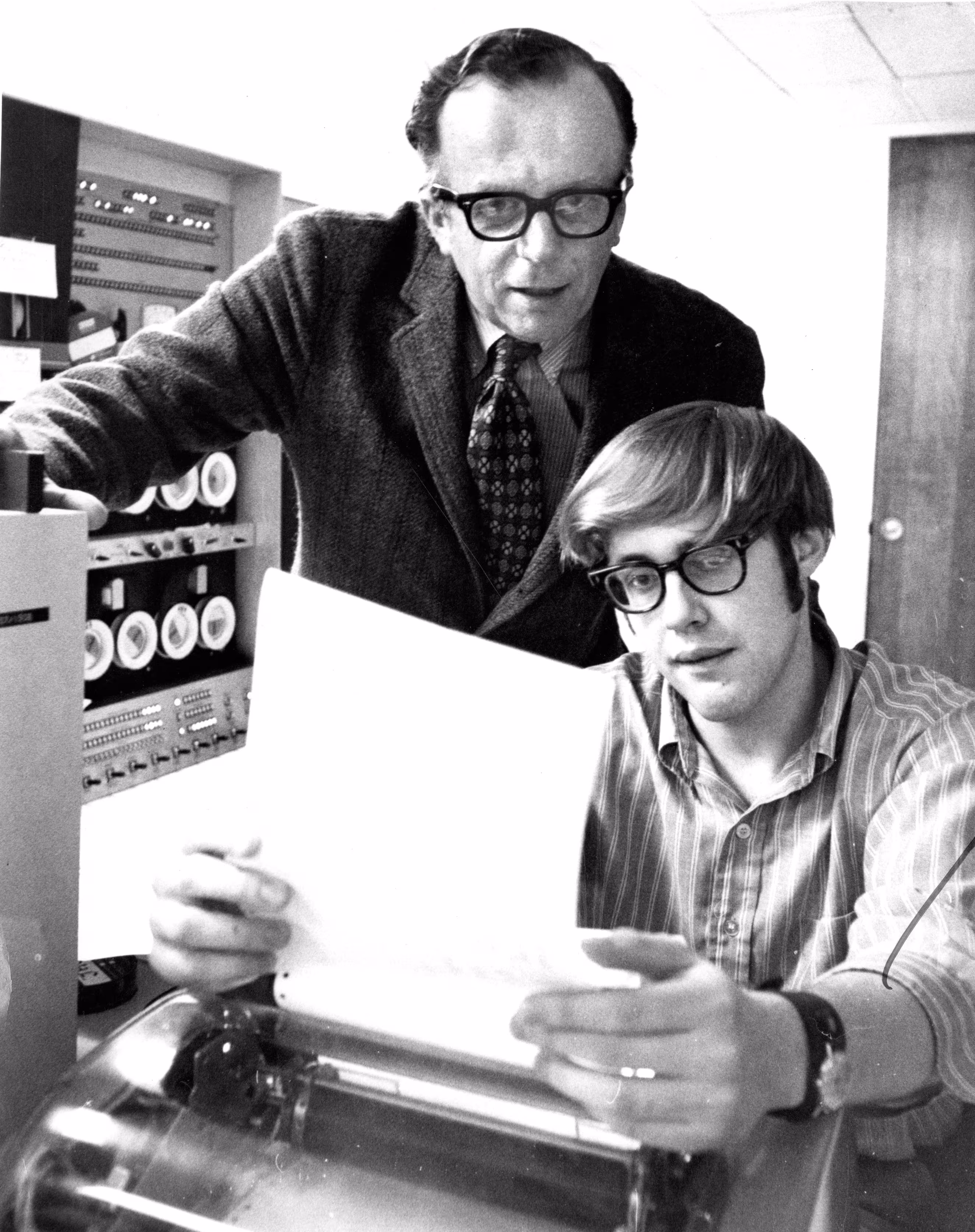 J.C.R. Licklider (top) and a student at MIT. Image from Philip Preston/The Boston Globe/Getty Images.